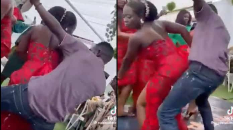 (VIDEO) Photographer loses focus at a wedding; steals the show with wild moves 2 Photographer