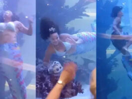 Shopping mall mermaid struggles for air